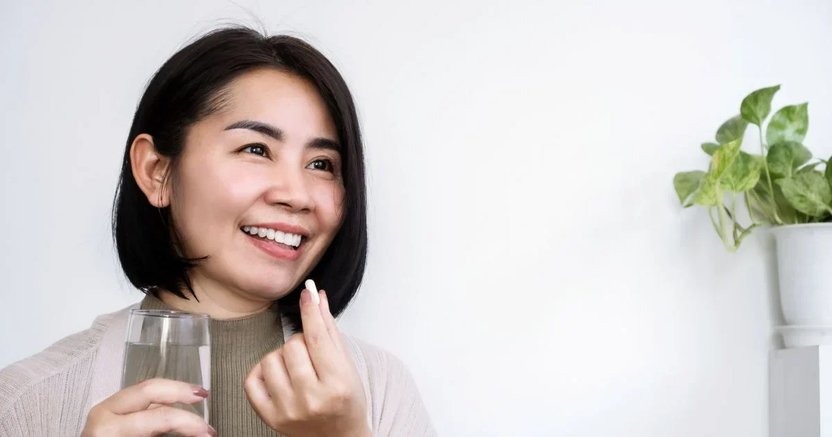 woman taking her prescribed anti anxiety medication